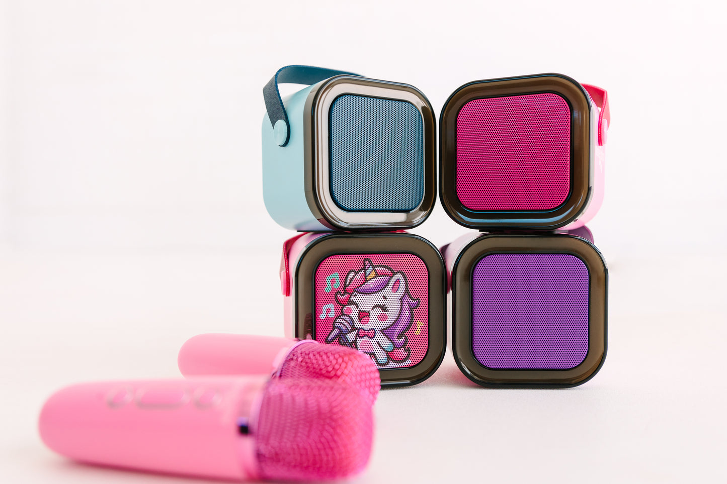 Kids Mini Karaoke Machine featuring 20+ pre-loaded kid songs like Twinkle Twinkle Little Star and Wheels on the Bus. Connects to phone or tablet via Bluetooth for playing songs from Spotify, YouTube, and Apple Music. Portable, durable design perfect for playdates and open mic nights. Includes 4 voice effects and echo mode for quality sound. Rechargeable battery provides up to 6 hours of playtime.