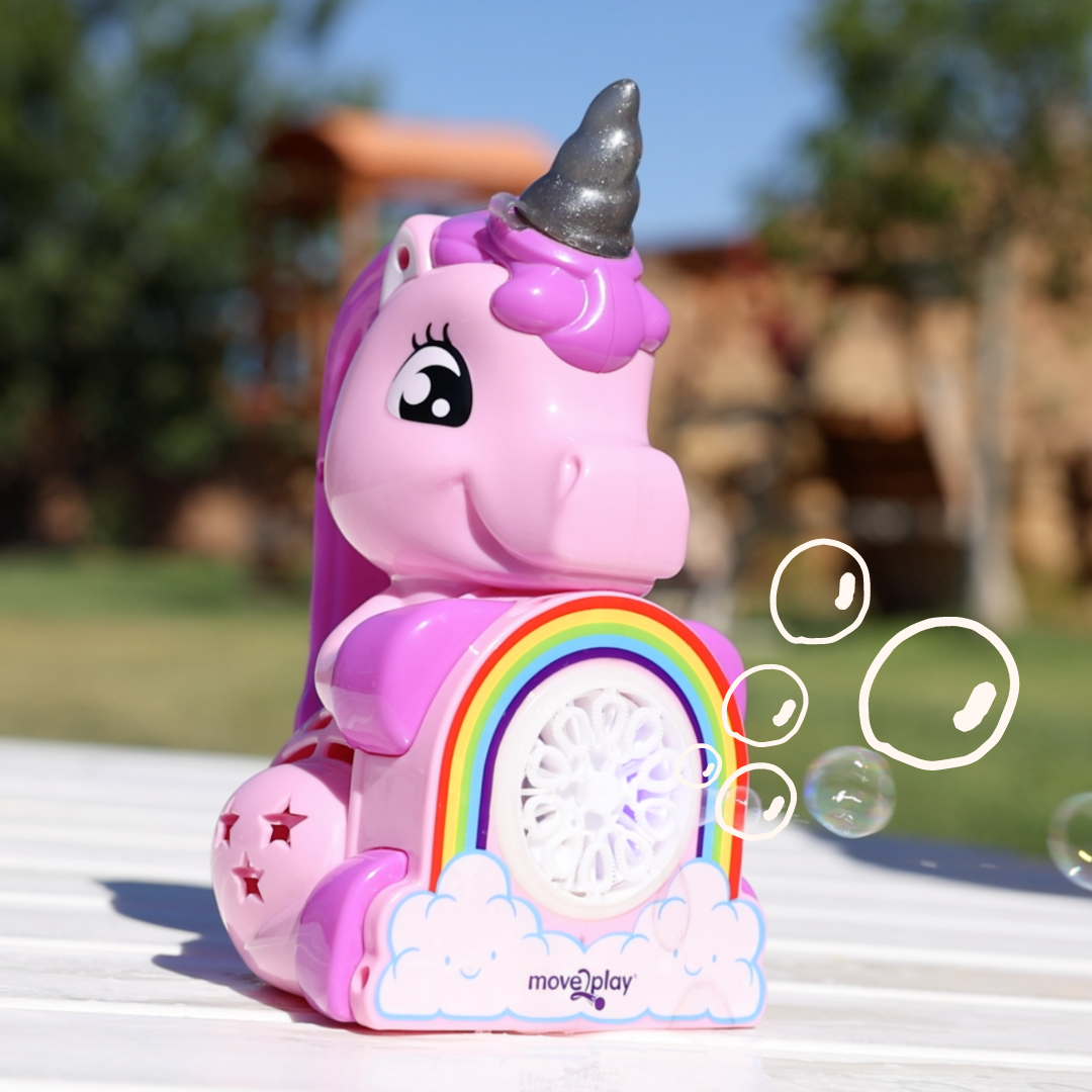 Child holding unicorn bubble blower toy with batteries and bubble solution included. Handheld design with durable, water-resistant features and easy-grip handle. Produces thousands of bubbles per minute for fun-filled occasions like birthdays and playdates.