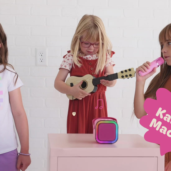 Kids Mini Karaoke Machine featuring 20+ pre-loaded kid songs like Twinkle Twinkle Little Star and Wheels on the Bus. Connects to phone or tablet via Bluetooth for playing songs from Spotify, YouTube, and Apple Music. Portable, durable design perfect for playdates and open mic nights. Includes 4 voice effects and echo mode for quality sound. Rechargeable battery provides up to 6 hours of playtime.