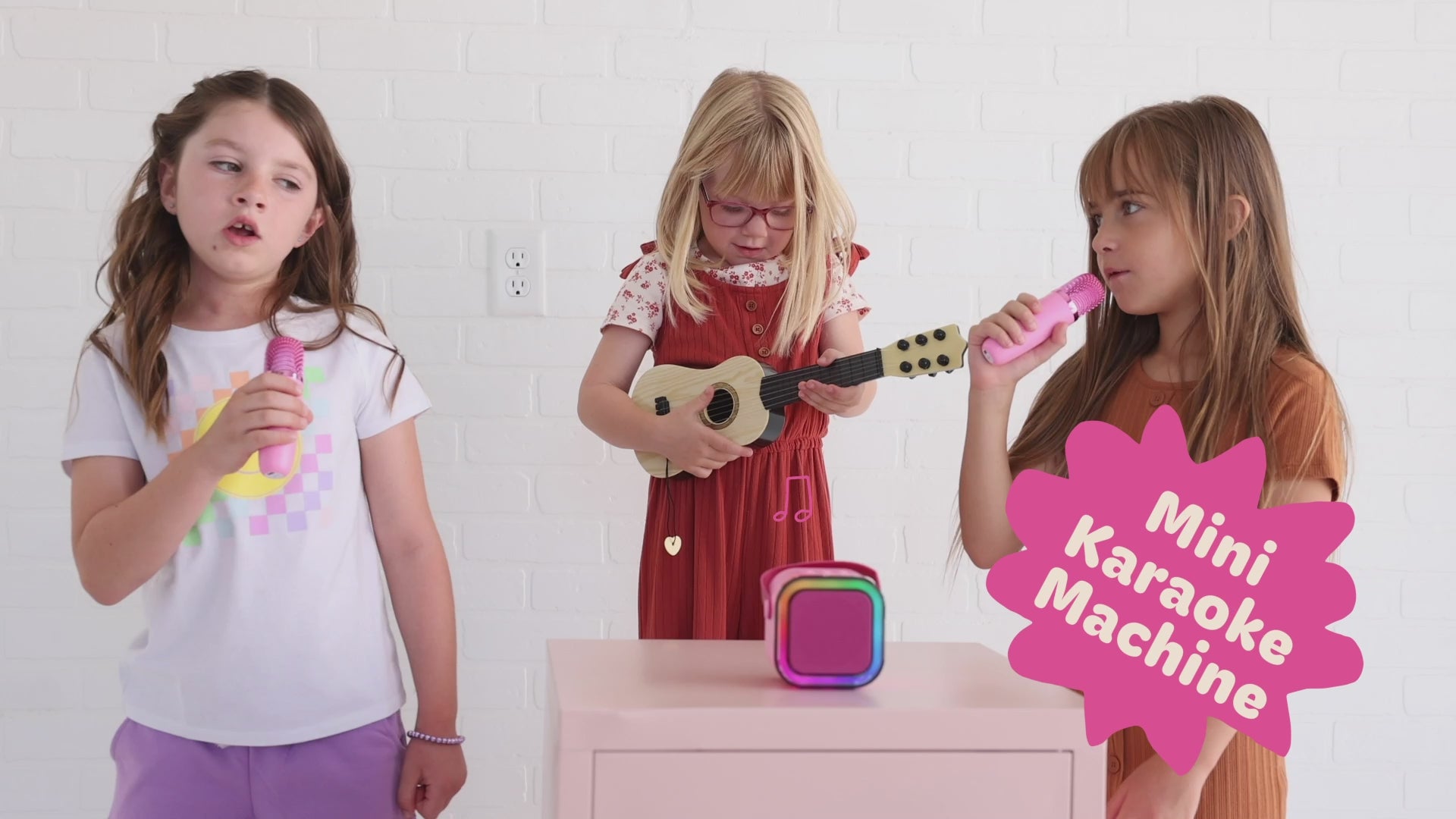 Kids Mini Karaoke Machine featuring 20+ pre-loaded kid songs like Twinkle Twinkle Little Star and Wheels on the Bus. Connects to phone or tablet via Bluetooth for playing songs from Spotify, YouTube, and Apple Music. Portable, durable design perfect for playdates and open mic nights. Includes 4 voice effects and echo mode for quality sound. Rechargeable battery provides up to 6 hours of playtime.