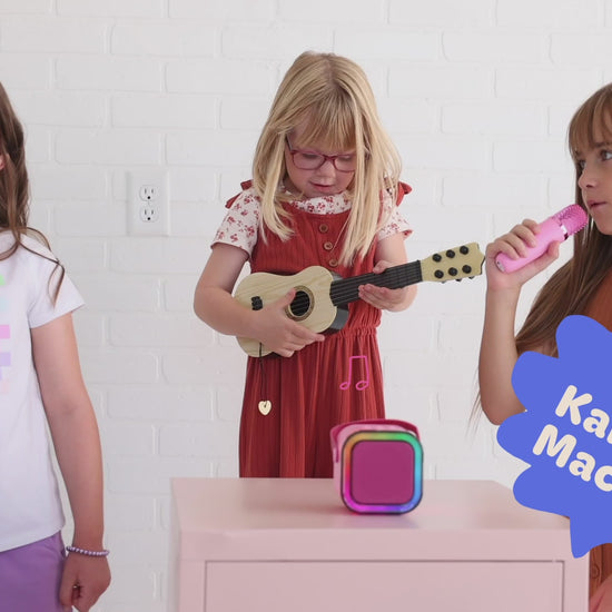 Kids Mini Karaoke Machine featuring 20+ pre-loaded kid songs like Twinkle Twinkle Little Star and Wheels on the Bus. Connects to phone or tablet via Bluetooth for playing songs from Spotify, YouTube, and Apple Music. Portable, durable design perfect for playdates and open mic nights. Includes 4 voice effects and echo mode for quality sound. Rechargeable battery provides up to 6 hours of playtime.