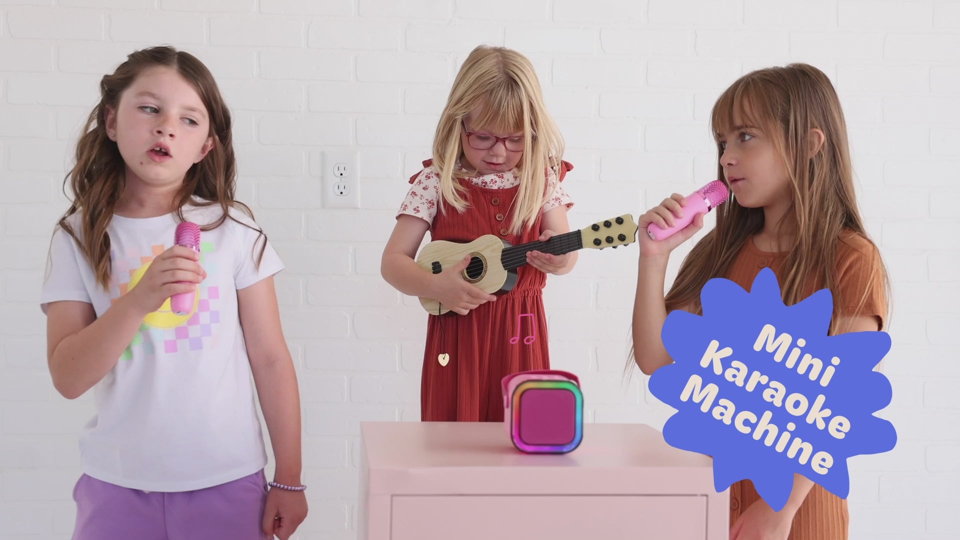 Kids Mini Karaoke Machine featuring 20+ pre-loaded kid songs like Twinkle Twinkle Little Star and Wheels on the Bus. Connects to phone or tablet via Bluetooth for playing songs from Spotify, YouTube, and Apple Music. Portable, durable design perfect for playdates and open mic nights. Includes 4 voice effects and echo mode for quality sound. Rechargeable battery provides up to 6 hours of playtime.